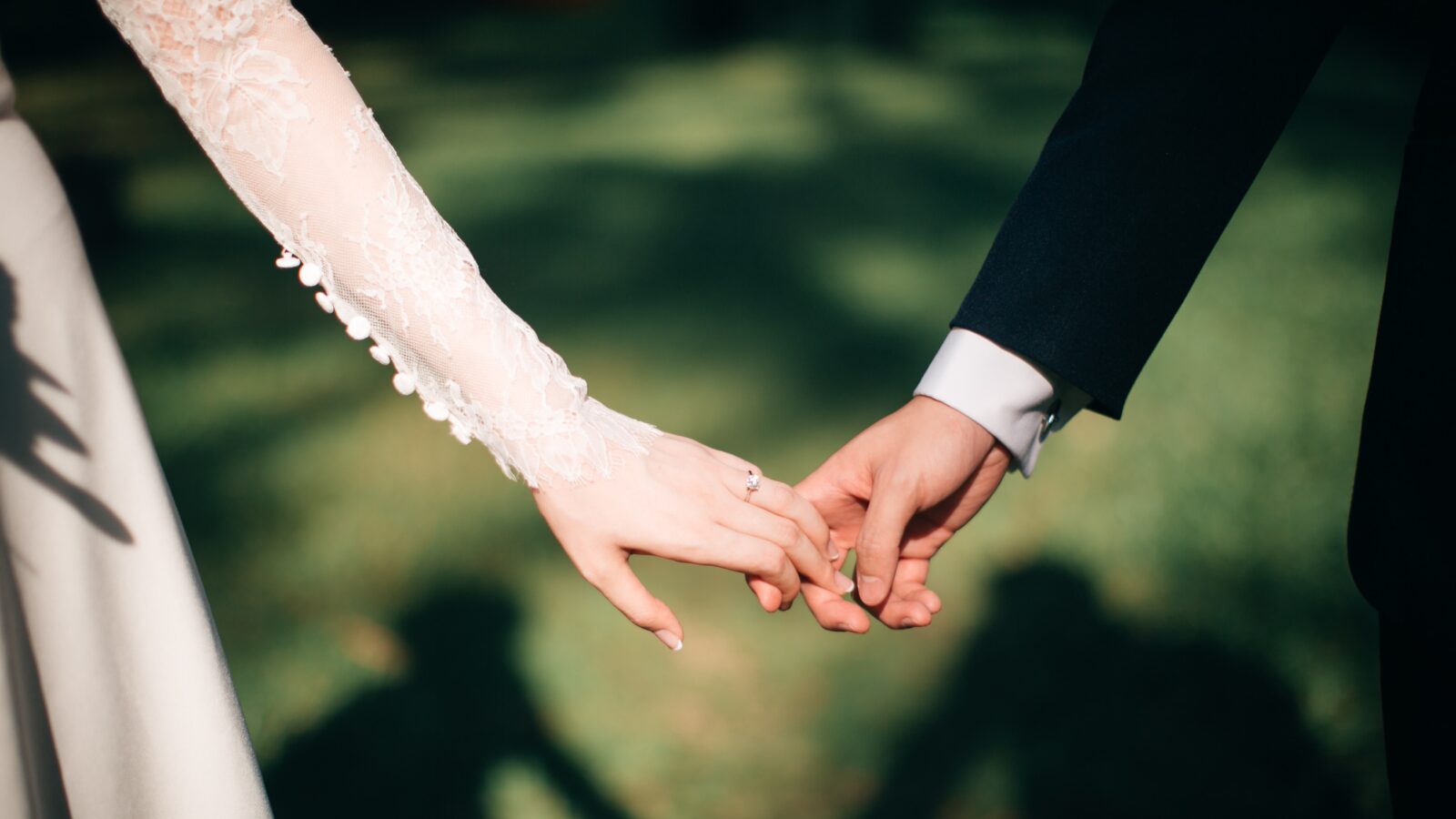 Man & Woman holding hands representing due diligence in marriage contracts